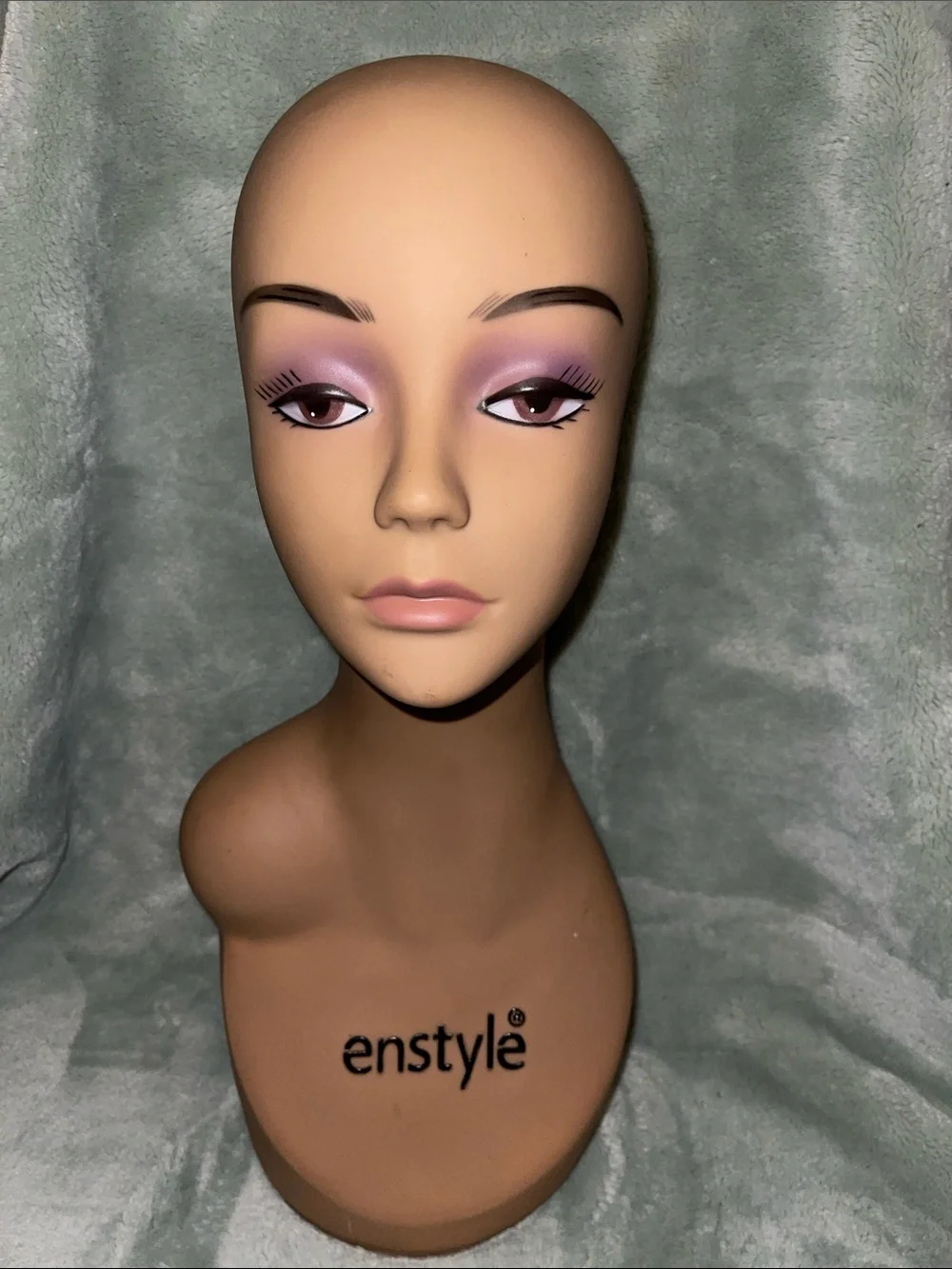 Tan Female Mannequin Head with Purple Makeup